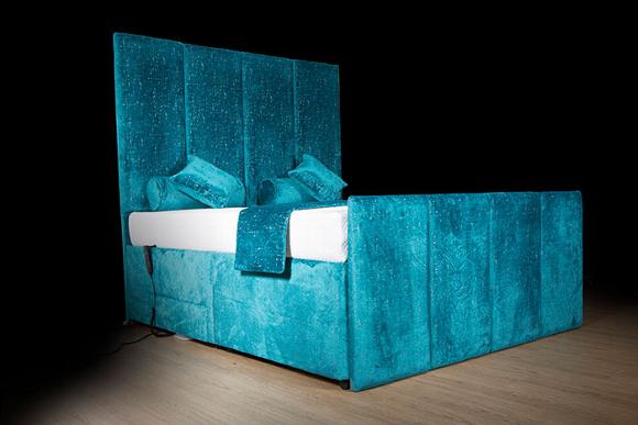 side view of Venezia luxury upholstered adjustable bed with adjustable remote