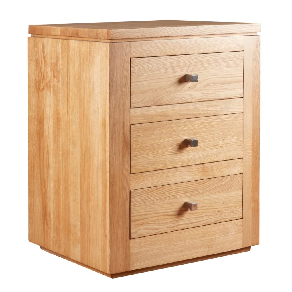York three drawer bedside cabinet handmade in solid European oak with square brushed metal handles, shown on plain white background